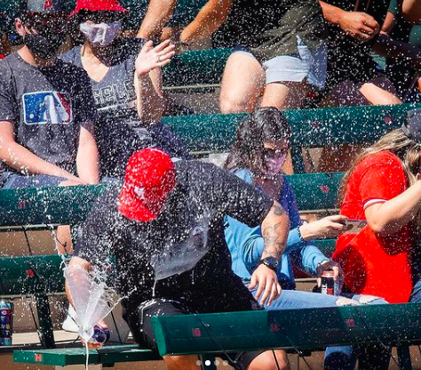 Man saves date from foul ball with his beer