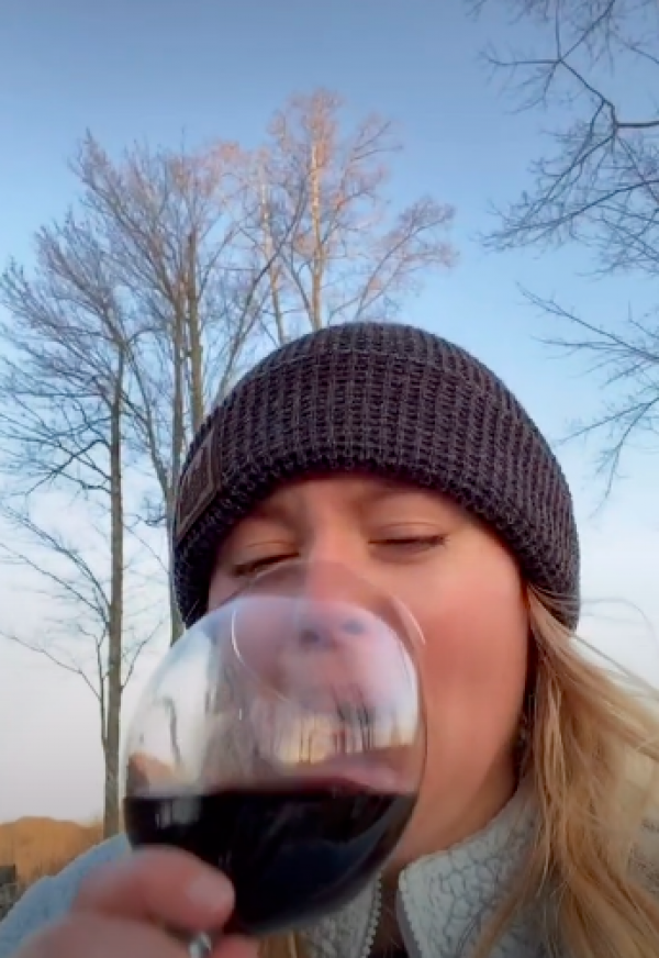 Woman left mortified after noticing her racy reflection in her wine glass