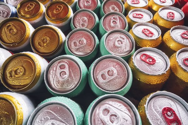 Truck carrying fizzy drinks crashes through fence spilling thousands of bottles of soda into farmer’s field