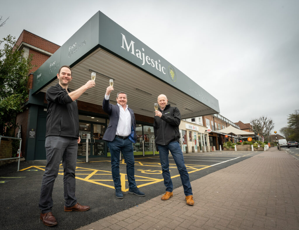 Majestic boss John Colley (middle) and Rob Cooke at the opening of a new store