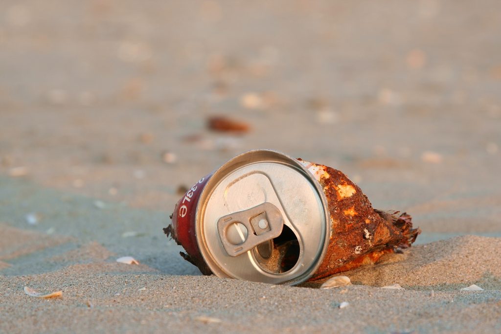 A can of beer on the beach - man finds 32-year-old cans of beer