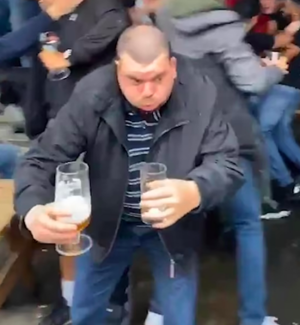 Video shows moment England fan heroically saves beer as fans wildly celebrate goal