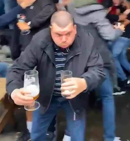 England fan heroically saves beer