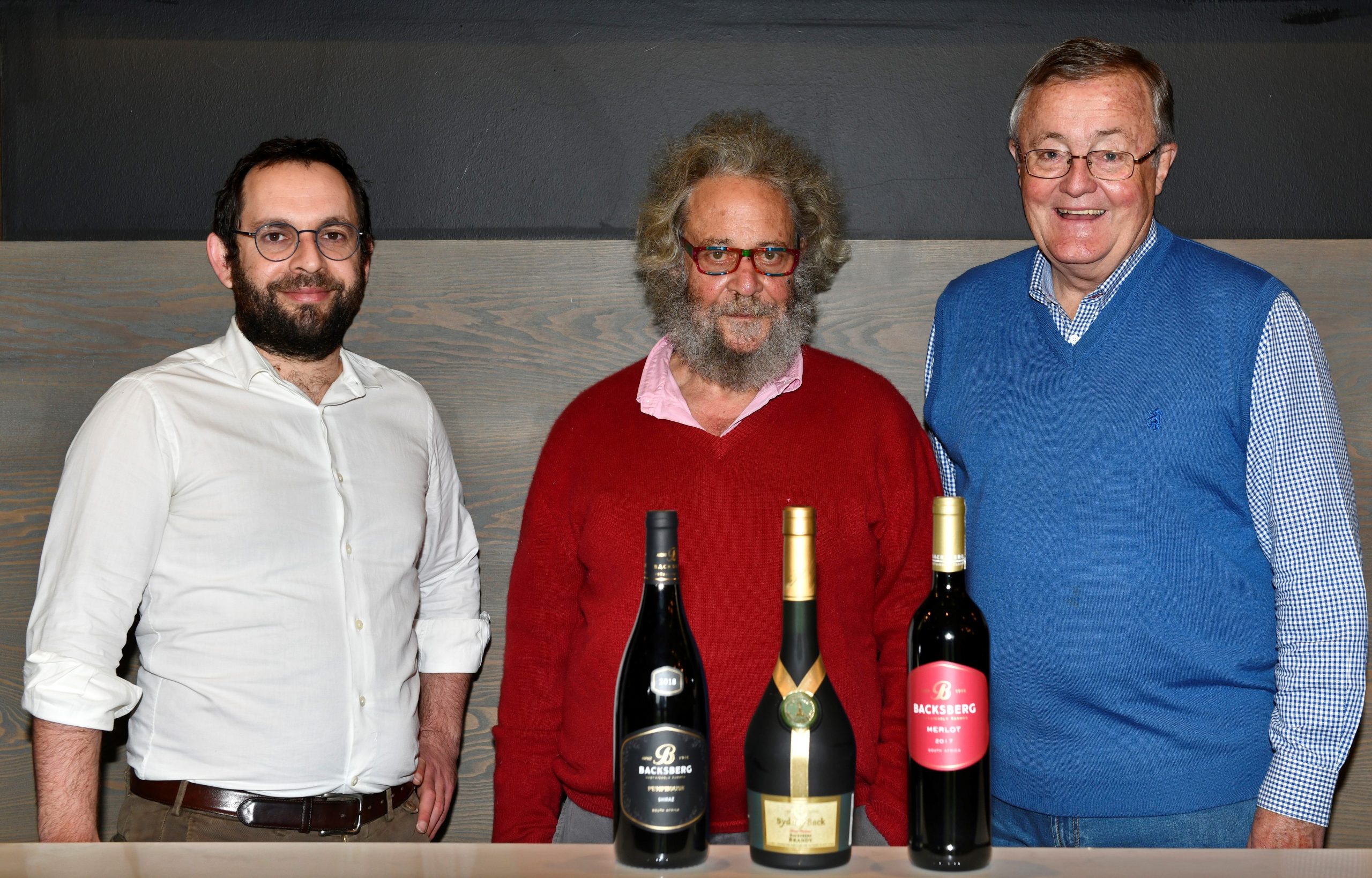 Simon and Michael Back with Tim Hutchinson, executive Chairman of DGB: DGB acquires a majority shareholding in Backsberg Family Wines