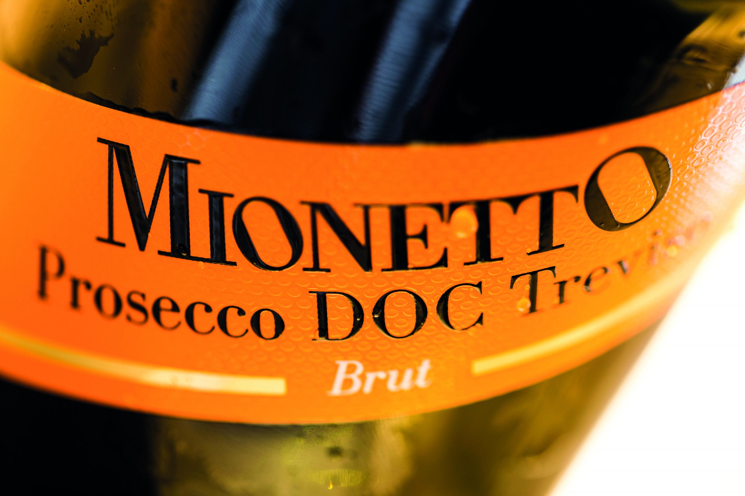 Close-up of Mionetto prosecco label: Henkell Freixenet acquisition of Filipopolis