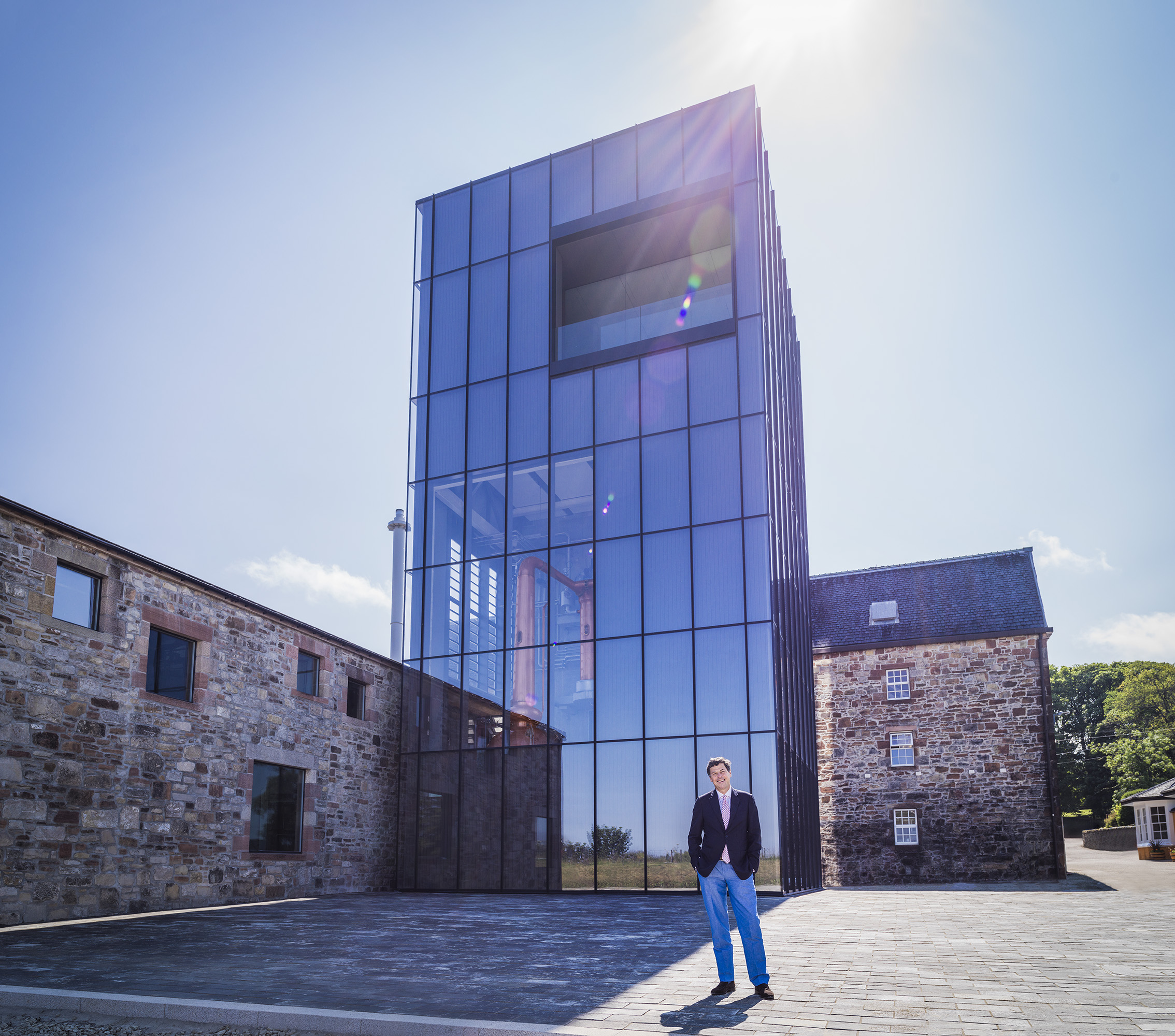 Bill Lumsden standing in front of Lighthouse distillery: Glenmorangie seeks innovation with new distillery
