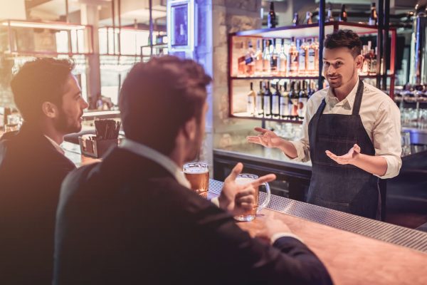 Man asks bartender to call police after spotting what group of men were wearing