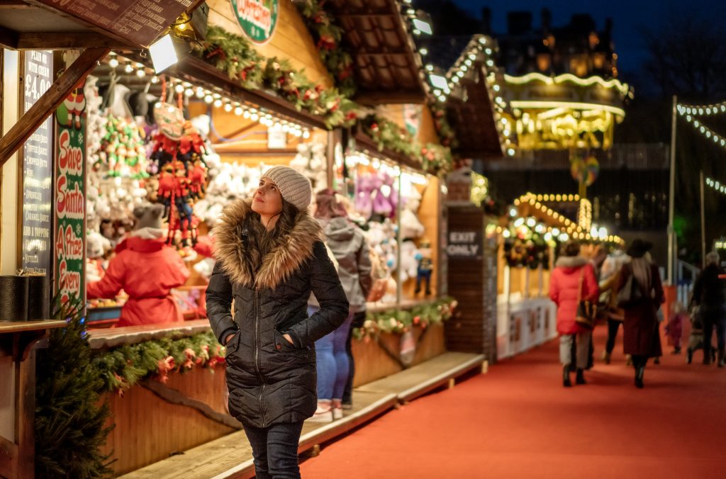 get paid to visit Christmas market - a Christmas market stall