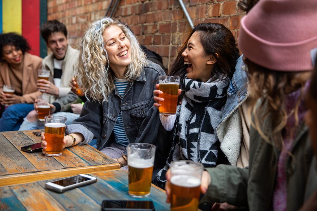 People enjoying beer together: price of a London pint