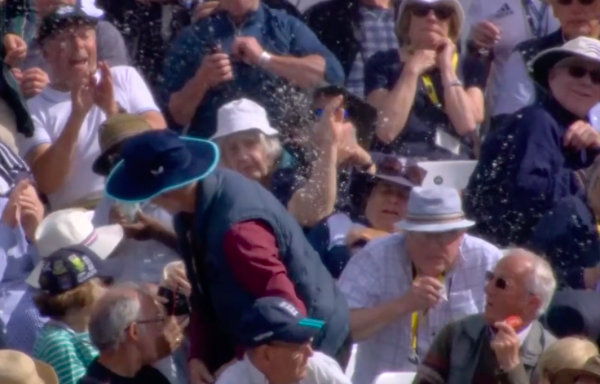 Footage shows moment cricket ball hit for six lands in beer