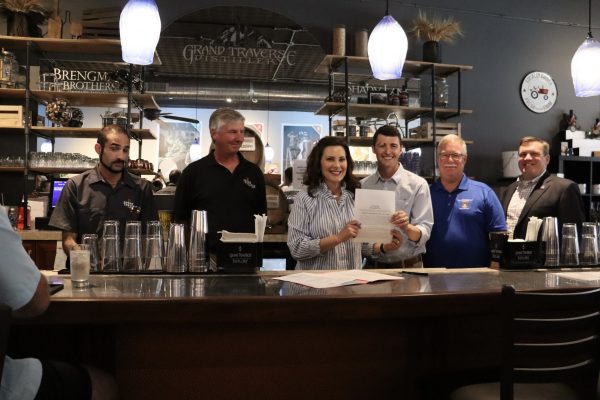 Michigan governor signs bill slashing mark-up for local distillers