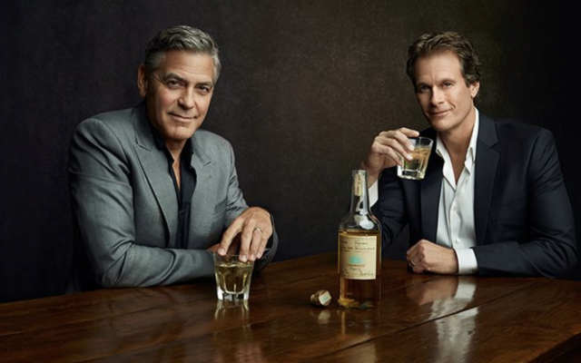 George Clooney poses with his Casamigos Tequila