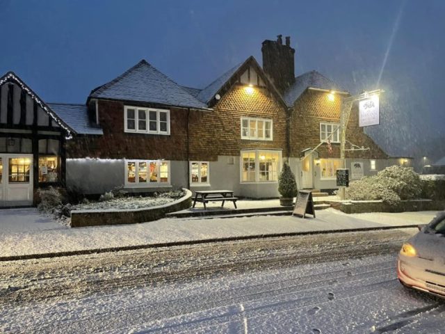 Picture of The Bear Inn in Sussex covered in snow: People forced to sleep in pub overnight due to snow