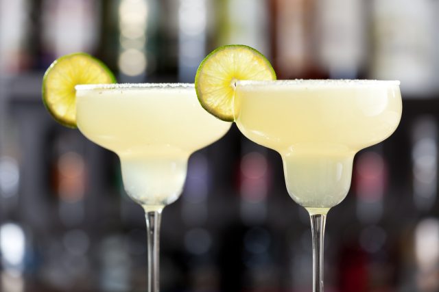 The margarita is a cocktail consisting of tequila mixed with orange-flavoured liqueur and lime or lemon juice, often served with salt on the glass rim.The drink is served shaken with ice, on the rocks, blended with ice (frozen margarita) or without ice (straight up): The five most popular cocktails in Europe