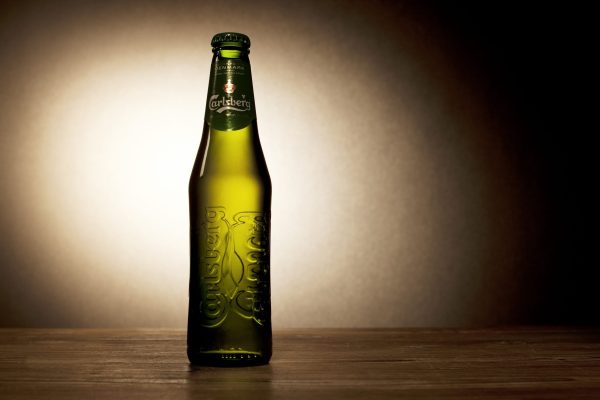 Carlsberg shares climb as it lifts profit forecast