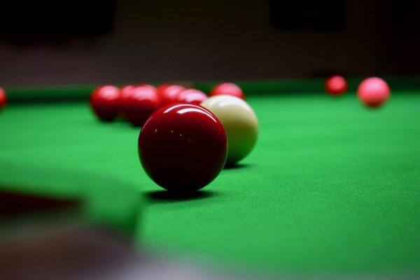 On the red: Snooker champ Stephen Hendry drinks wine before match