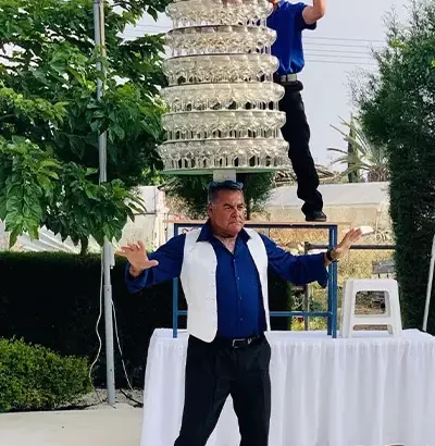 Cypriot man shatters wine glass balancing record