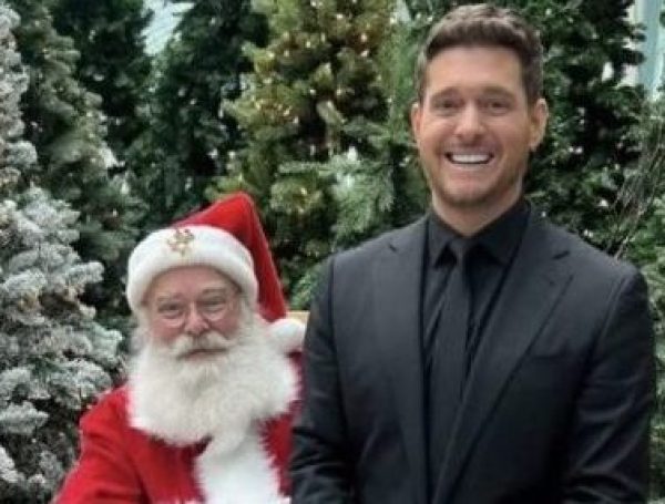 Michael Bublé serves whiskey to army of Santas