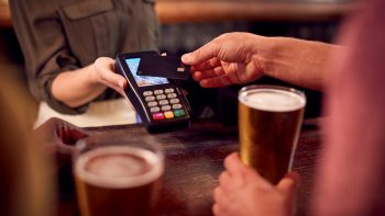 Pub charges customers more for ordering at the bar