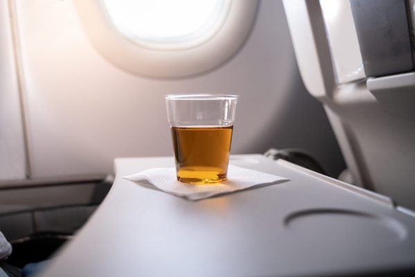 Does drinking on planes help or hinder sleep?