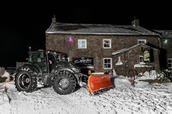 Sausages and Malbec delivered to snowed-in pub punters