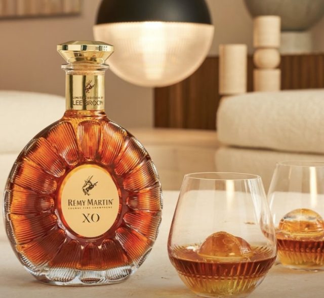 A bottle of Remy Martin Cognac. Rémy Cointreau has posted its first quarter of sales growth since early 2023, outpacing analyst expectations. The Cognac and liqueurs maker also raised its profit outlook despite looming US tariffs.