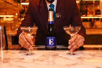 Why has Elton John launched an alcohol-free alternative to Champagne?