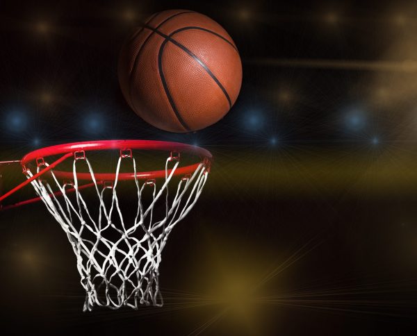 NBA star Isiah Thomas slam dunks with two kosher Champagnes