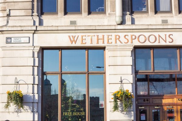 Wetherspoon sales hold firm as costs weigh on profits