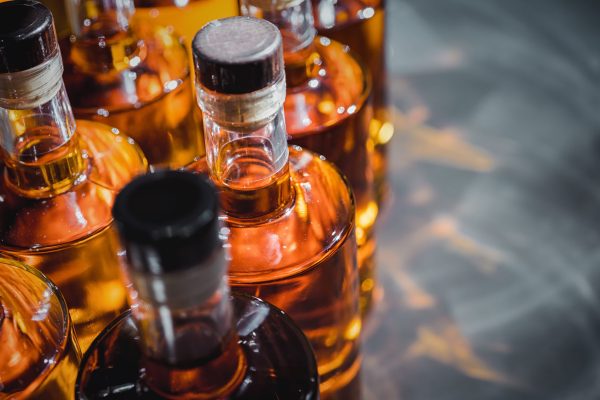 Duo busted smuggling 888 booze bottles into Malaysia