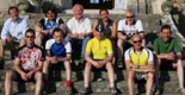 Cyclists rake in charity cash