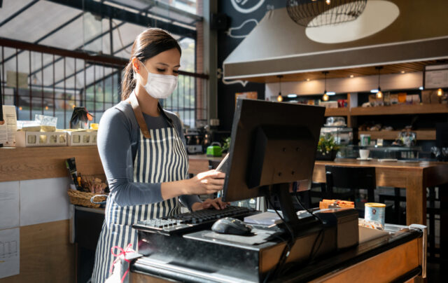 Waitress working in a mask