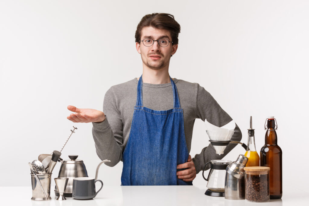 A bartender judging a drinks order